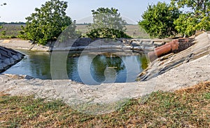 Agricultural canal or irrigation canal in a concrete wall Direct water to the farmer`s farmland in arid areas of risky farming