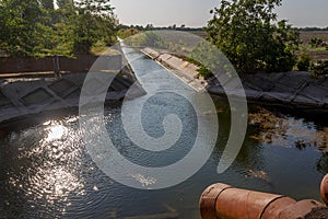 Agricultural canal or irrigation canal in a concrete wall Direct water to the farmer`s farmland in arid areas of risky farming