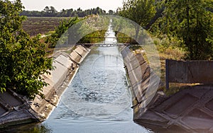 Agricultural canal or irrigation canal in a concrete wall Direct water to the farmer`s farmland in arid areas of risky farming