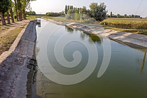 Agricultural canal or irrigation canal in a concrete wall Direct water to the farmer`s farmland in arid areas of risky farming