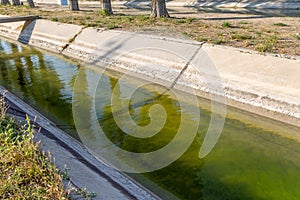 Agricultural canal or irrigation canal in a concrete wall Direct water to the farmer`s farmland in arid areas of risky farming