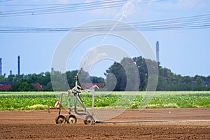 Agricultural field irrigation, Irrigation system for irrigating crops Waters the freshly sown field. Irrigation equipment