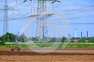 Agricultural field irrigation, Irrigation system for irrigating crops Waters the freshly sown field. Irrigation equipment