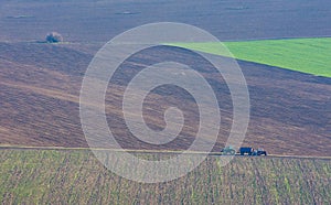 agricultural field with sowing equipment