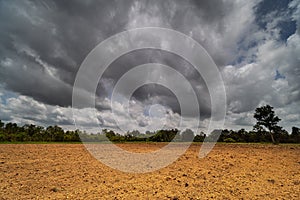 Agricultural Field With Storm Clouds