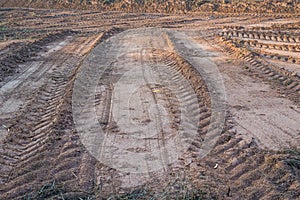 Agricultural field on which drove heavy vehicles.