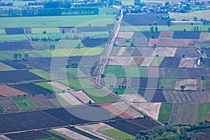 Agricultural fields. Harvested agricultural fields and dirt roads from above