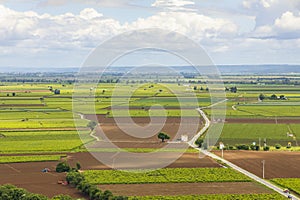 Agricultural fields landscape with dramatic sky
