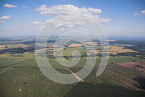 Agricultural fields and sky, view from plane. Kazan, Russia