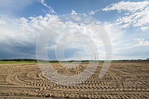 Agricultural landscape, plowed field.