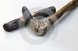 Agricultural lithic tool with wooden handle assembled with tendon