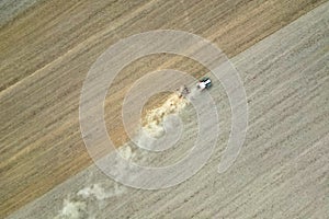 Agricultural Machine Tractor Cultivating by Harrowing a Wide Farmland