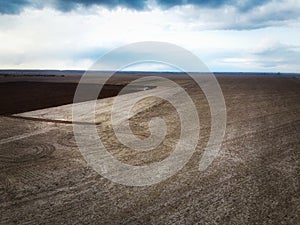 Agricultural machinery in the field, aerial view. Agricultural work