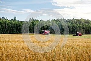 Agricultural machinery goes to work in the field.