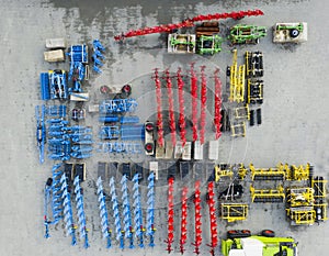 Agricultural machinery, harrows, plows, seeders. View from above photo