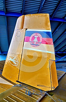 Agricultural plane in yellow with GDR flag