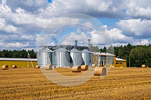 Agricultural silos. Building for storage and drying of grains, wheat, corn. Grain elevator. Agribusiness concept