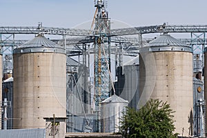 Agricultural silos of concrete and metal.