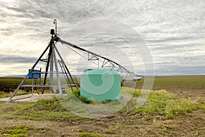 Agricultural sprinkler and fertigation tank. photo
