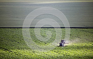 Agricultural works, two tractors weeding field