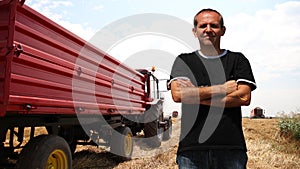 Agriculturalist in a Wheat Field During Harvest