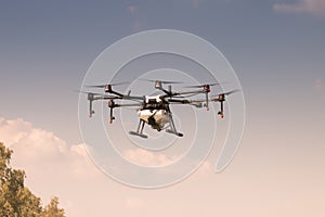 Agriculture drone aircraft for farming fly on sky photo