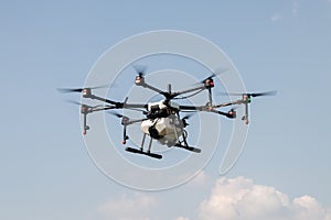 Agriculture drone aircraft for farming fly on sky photo