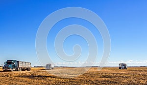 Agriculture equipment in a harvested field