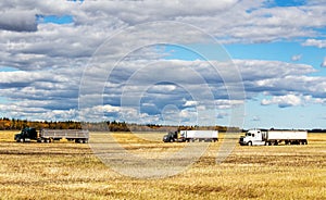 Agriculture equipment in a harvested field