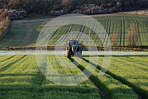 Agriculture - Farmer Spraying Crops