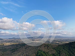 Agriculture fields from aerial with blue sky and white clouds