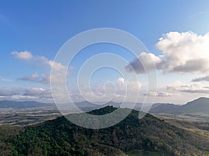 Agriculture fields from aerial with blue sky and white clouds