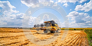 Agriculture machine harvesting crop in fields, Special technic in action. Agricultural concept.