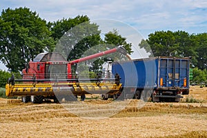 Agriculture machine harvesting crop in fields, Special technic in action. Agricultural concept