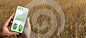 Agriculture technology concept man Agronomist Using a Tablet in an Agriculture Field read a report