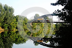 Agriculture tractor in beautiful landscape