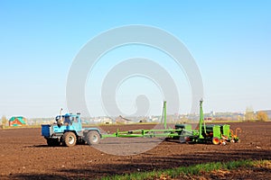 Agriculture tractor with drill