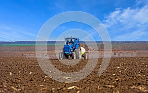 Agriculture tractor sowing seeds.