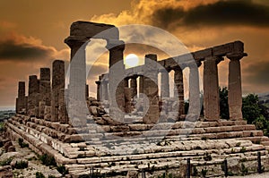 Agrigento, the Valley of the Temples, a suggestive dawn illuminates the ruins of the Temple of Hera Lacinia