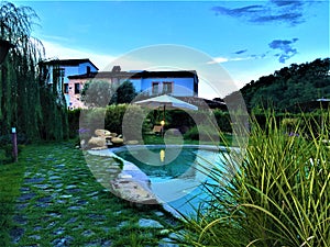 Agritourism in Marche, sunset and swimming pool