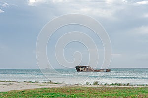 Aground ship in a blue caribbean sea