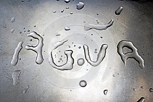 Agua written with water photo