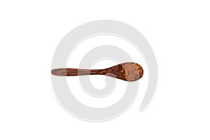 Aguaje flour in wooden spoon on white background. Aguahe powder. Dried and pulverized pulp of aguaje can relieve menstrual photo