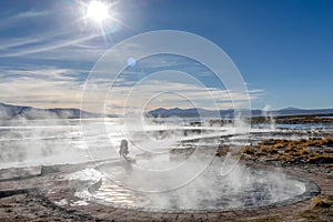 Aguas termales de Polques, hot springs with a pool of steaming natural thermal water in Bolivia