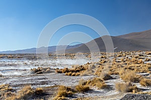 Aguas termales de Polques, hot springs with a pool of steaming natural thermal water in Bolivia