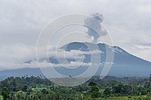Agung volcano eruption view near rice fields, Bali