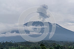 Agung volcano eruption view near rice fields, Bali