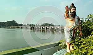 The ahathiya statue in the Grand aged dam of Kallanai constructed by king karikala chola with granite stone. photo