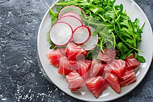 Ahi Tuna Seviche with Radish Slices and Rucola on White Plate Top View, Raw Fish Fillet Called Cebiche