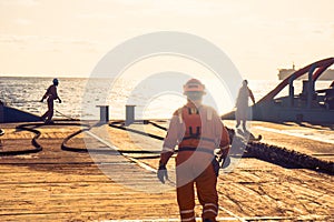 AHTS vessel doing static tow tanker lifting. Ocean tug job